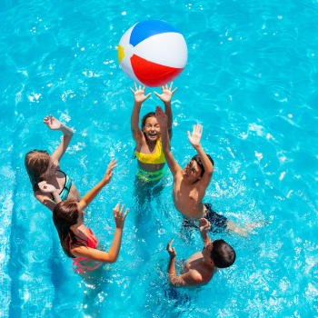 Tweens and teens playing in the pool